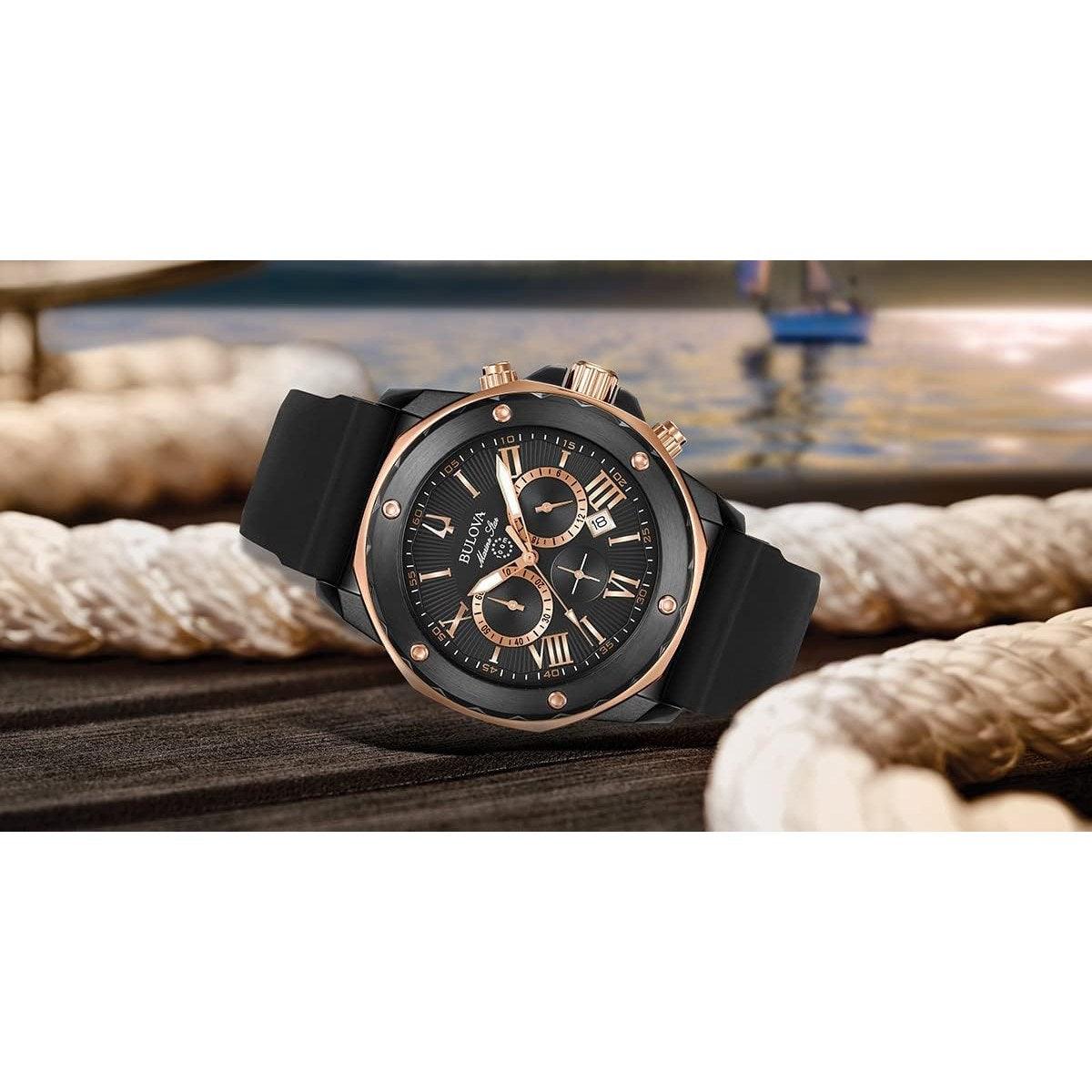 Reloj cronógrafo de cuarzo de acero inoxidable con revestimiento iónico, de 6 manecillas y correa de silicona negra, de Bulova, serie Marine Star para hombre, color negro y dorado, estilo: 98B307 